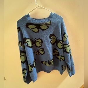 Over sized small blue butterfly sweater.